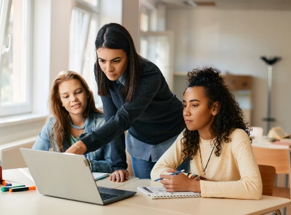 a teacher speaks to students